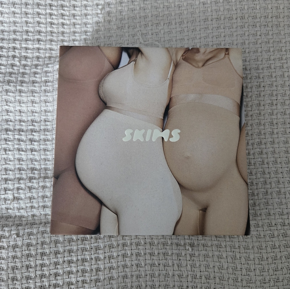 SKIMS seamless sculpt maternity bodysuit mid thigh